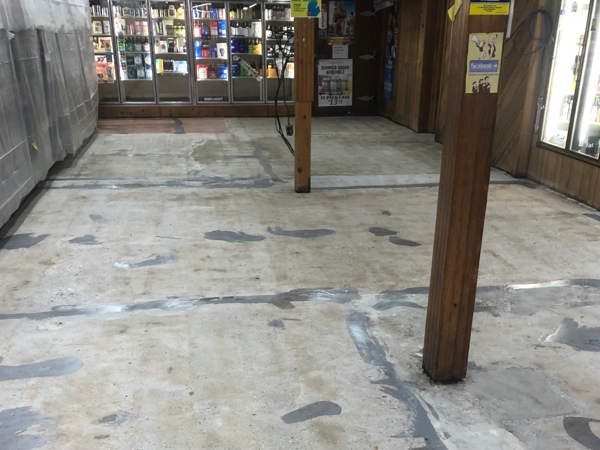 Gas station concrete floor prepped for coating by Rhino Epoxy