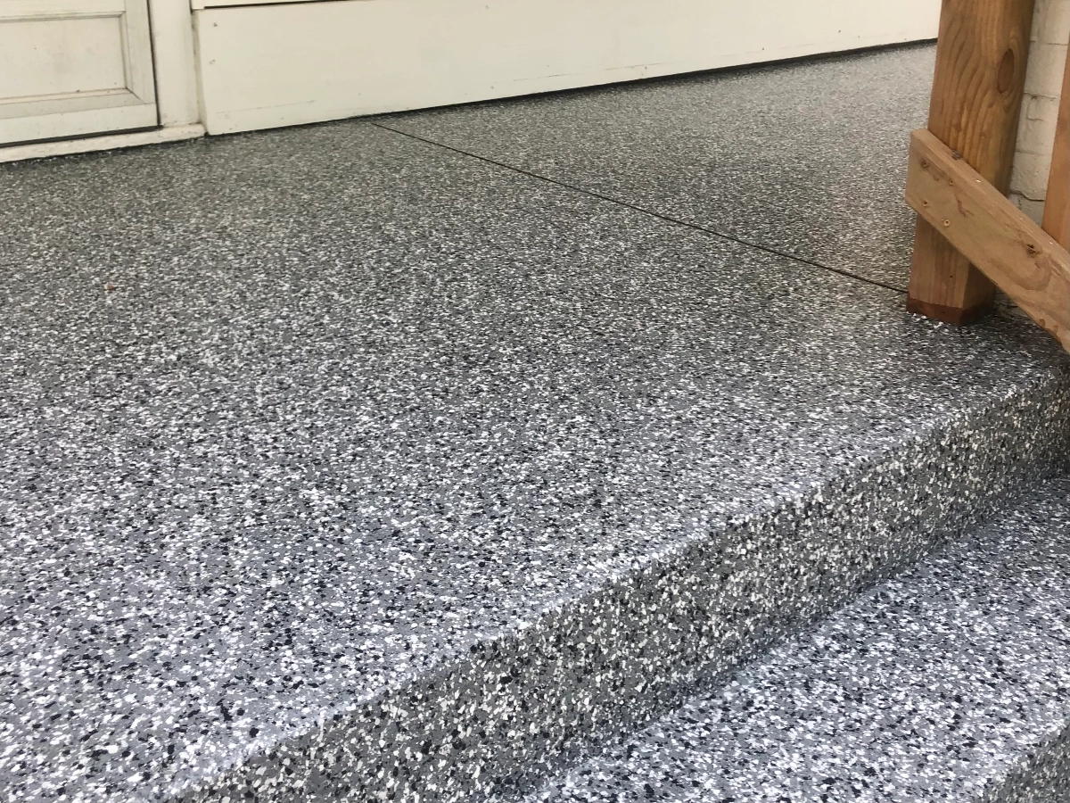 Residential exterior stair and patio finished with a flake epoxy design